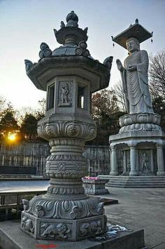 two large statues sitting next to each other