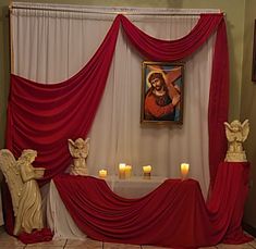 the altar is decorated with candles and statues