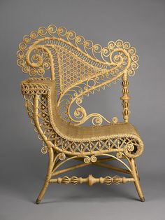 an intricately designed chair is shown against a gray background