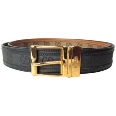 Gucci Black with Gold Tone Belt Buckle. Signature GG on the canvas with leather trim. This was purchased in the early 90s and still has the tag on it. Labeled a size 44 - Measures 1.15 inches wide. First belt hole is at 41 inches and the belt is 47 inches with the buckle. This is out of a massive collection of Contemporary designer clothing as well as Hopi, Zuni, Navajo, Southwestern, sterling silver, costume jewelry and fine jewelry from one collector. Be sure to check our store front for more fabulous pieces from this collection. We have been selling this collection on 1st dibs since 2013. You can Follow us via storefront as well. Thank you, Any questions please call, email or hit contact. Designer Belts, Black Leather Belt, Vintage Belts, Gucci Black, Gucci Handbags, Gucci Belt, Canvas Leather, Belt Size, Belt Buckle