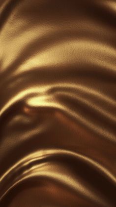 an abstract gold background with wavy lines