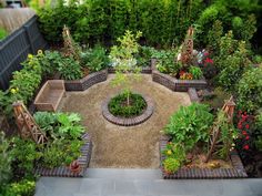 an aerial view of a garden with various types of flowers and plants in the center