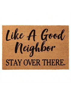 a door mat that says like a good neighbor stay over there