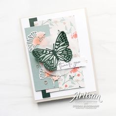 a close up of a card with a butterfly on it