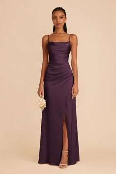 a woman in a long purple dress