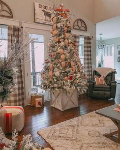 a decorated christmas tree in a living room