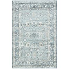 a light blue rug with an ornate design on the front and back side, in various colors