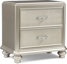 a silver nightstand with two drawers on it