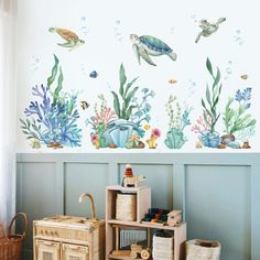 an ocean themed wall with sea animals and fish