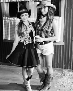 two young women dressed in western style clothing