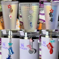 several cups with key chains hanging from them