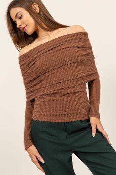 Enhance your style with this sophisticated Fuzzy Off-Shoulder Textured Knit Top. Boasting a unique combination of ribbed and fuzzy textures, this knit top is not only stylish but also comfortable. The off-shoulder neckline adds a touch of sophistication, making it suitable for both casual and dressy occasions. Pair it with tailored trousers or a skirt for a chic and effortless outfit that exudes elegance. Features: Basic style Stretch: Moderate stretch Material composition: 50% polyester, 40% ny Trendy Ribbed Sweater For Party, Trendy Off-shoulder Knit Top, Trendy Off-shoulder Ribbed Sweater, Ribbed Winter Party Tops, Ribbed Party Tops For Winter, Winter Party Ribbed Tops, Winter Ribbed Off-shoulder Tops, Ribbed Off-shoulder Winter Tops, Textured Tops For Fall