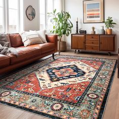 a living room filled with furniture and a large rug