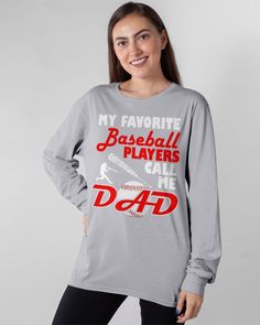 a woman wearing a baseball player's long sleeve t - shirt that says, my favorite baseball players call me dad