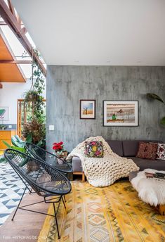 a living room filled with furniture and decor