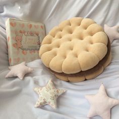 there is a cake and some stars on the bed