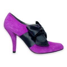 Unlock Your Inner Maria Antoinette Or Carrie Bradshaw With These Formal Purple Suede Pumps With A Black Silk Thick Ribbon Bow. They Have An Eye Let Perp Hole. Perfect For A Night Out, Wedding, Or Any Formal Event, These Heels Will Sure Be Your Statement Piece. Tag Size: 6m Style: Bouffant | Ew 99190 Heel: 4" Condition: New Without Tags (Tags Were Removed From Bottom Due To Peeling) Shoe K Purple Pointed Toe Heels For Gala, Chic Purple Heels For Gala, Elegant Fitted Purple Heels, Elegant Purple Evening Heels, Formal Purple Heels With Leather Sole, Purple Heels With Leather Sole For Formal Events, Purple Heels With Leather Sole For Formal Occasions, Purple Closed Toe Heels For Evening, Purple High Heels With Leather Sole