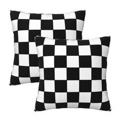 two black and white checkered pillows sitting on top of each other