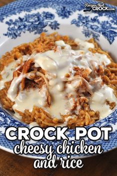 crock pot cheesy chicken and rice on a blue and white plate