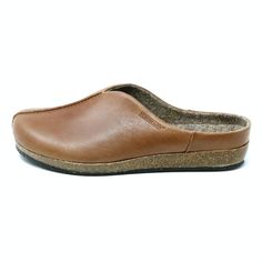 PRICES MAY VARY. Vegetable tanned leather upper Wide toe box for comfort Interior lined with real wool felt Removable felt covered EVA insole with arch support Contoured cork/latex support sole Low heel cup helps keep shoe secure ● Slipper Level Comfort: A wool-lined interior provides unmatched soft comfort inside with a fashionable exterior. Leather Slippers With Cushioned Footbed, Leather Slippers With Cushioned Footbed, Closed Toe, Modern Leather Slippers With Cushioned Footbed, Brown Leather Plain Toe Slippers, Brown Wool Slippers With Round Toe, Comfortable Leather Slippers, Leather Clogs With Removable Insole For Everyday Use, Leather Slippers With Removable Insole For Everyday Use, Everyday Leather Slippers With Cushioned Footbed