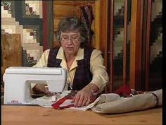 an older woman is using a sewing machine