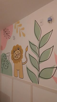 a painted wall with a lion and leaves on it