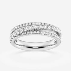 a white gold ring with three rows of diamonds