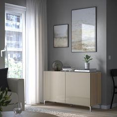 a living room scene with focus on the sideboard