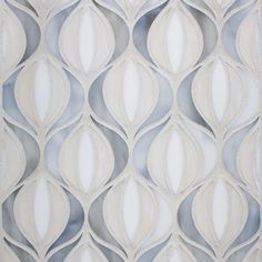 an art deco wallpaper pattern in white and grey colors with wavy lines on it