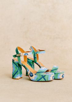 High-heeled sandals;Made in our Portuguese atelier;Buckle ankle strap fastening system;Textile exterior;Leather lining and insole;Rubber outsole;Leather-covered heel;Heel height: 10 cm / 3.9 in;Platform height: 3 cm / 1.2 in Farfetch Shoes, High Sandals, Colorful Heels, Fun Heels, Priscilla Presley, Blue Heels, Sheep Leather, Rimini, Bag Dress