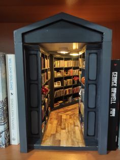 an open book case with several books on the shelves