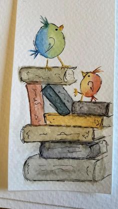 a drawing of two birds sitting on top of books