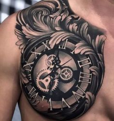 a man with a clock tattoo on his chest