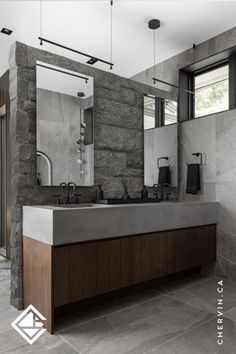 Custom walnut vanity with concrete countertop. Modern Industrial Bathroom, Concrete Counter Top, Mansion Kitchen, Room Vanity Ideas, Industrial Bathroom Vanity, Divider Wall, Main Bathroom, Concrete Countertops, Beautiful Bathrooms