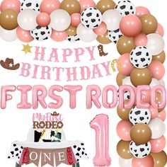 a first rodeo birthday party with balloons and decorations