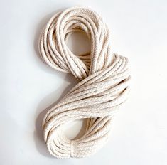 a white rope on a white surface