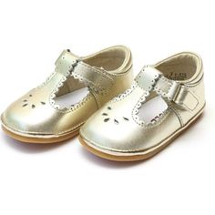 The dainty details of this scalloped t-strap from Angel Shoes make this shoe a must-have for your little girl. This style tends to run big. You may want to size down; please refer to the size chart. | Angel Shoes | Baby Dottie Scalloped T-Strap Metallic Mary Jane, Gold (Gold Metallic, Size 3)  |  Maisonette collects the best children’s products from around the world (unlike Zulily, Etsy, The Tot, Farfetch Kids, Childrensalon, Crate and Kids, Kohls, Wayfair, Buy Buy Baby, Nordstroms, Mini Boden, Angel Shoes, Gold Mary Janes, Shoe Wardrobe, Scalloped Trim, Shop Shoes, Baby Walker, Buy Buy, Crib Shoes, Shoes Baby