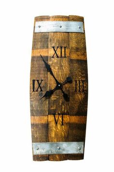 a wooden clock with roman numerals on it