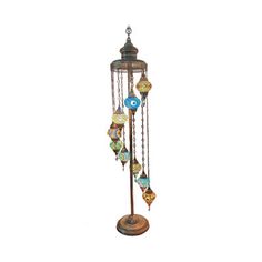 an old fashioned wind chime with many colorful beads