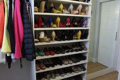 a closet filled with lots of different types of shoes