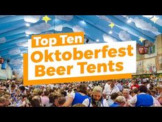 a large group of people in a building with a sign that says top ten oktoberfest beer tents