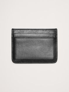 Keep your cards organized with this sturdy , pebbled leather card case.  Five card slots.  Height: 2. 75" Width (folded): 4" Formal Bifold Card Holder With Card Slots, Classic Black Trifold Wallet With Card Slots, Classic Black Bifold Card Holder, Classic Rectangular Card Holder With Card Slots, Classic Rectangular Wallets With Interior Card Slots, Classic Bifold Card Holder For Daily Use, Classic Rectangular Wallet With Interior Card Slots, Classic Black Card Holder For Daily Use, Classic Black Wallets With Card Slots