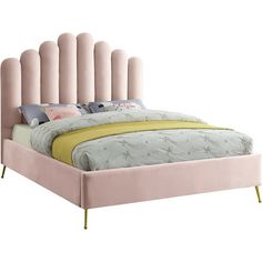 an upholstered bed with pink velvet headboard and foot board in front of a white background