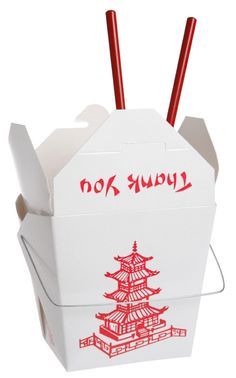 a chinese take out box with chopsticks sticking out of it's side