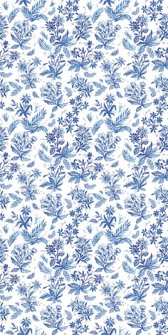 a blue and white wallpaper with leaves on it