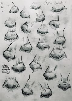 a drawing of different shapes and sizes of objects in charcoal pencils on white paper