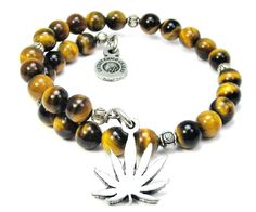 This is a unique and eye catching tiger's eye glass beaded wrap around bracelet. Each wrap includes a lovely 22mm charm that is hand cast and finished in the USA, using genuine 100% American pewter. The modern wrap style of this bracelet makes it one size fits all. This beautifully hand strung wrap is a true conversation piece. Dead Beat, Wrap Around Bracelet, Beaded Wrap Bracelets, Eye Glass, Beaded Wraps, Free Sign, Hand Cast, Tiger's Eye, Conversation Piece