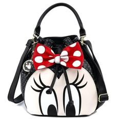 Loungefly Disney Minnie Mouse Bow Crossbody Bucket Bag Minnie Mouse has been by Mickey's side since their debut in late 1928. Represent one of your beloved classic Disney characters with this Minnie Mouse-themed bucket bag that cinches at the top and boasts a red and white polka-dot lining. The bag is made of vegan leather and decorated with appliques, an enamel keychain, and printed details. Bag Dimensions: 12"W x 11"H x 5"D Vegan Leather EA-K5 Have a wonderful day and Make sure to check out th Classic Disney Characters, Minnie Bow, Mini Mochila, Bucket Purse, Minnie Mouse Bow, Loungefly Bag, Disney Handbags, Loungefly Disney, Crossbody Wallet