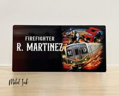 a metal sign that says firefighter r martinez