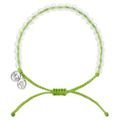 a green string bracelet with two charms on the end and a white beaded cord